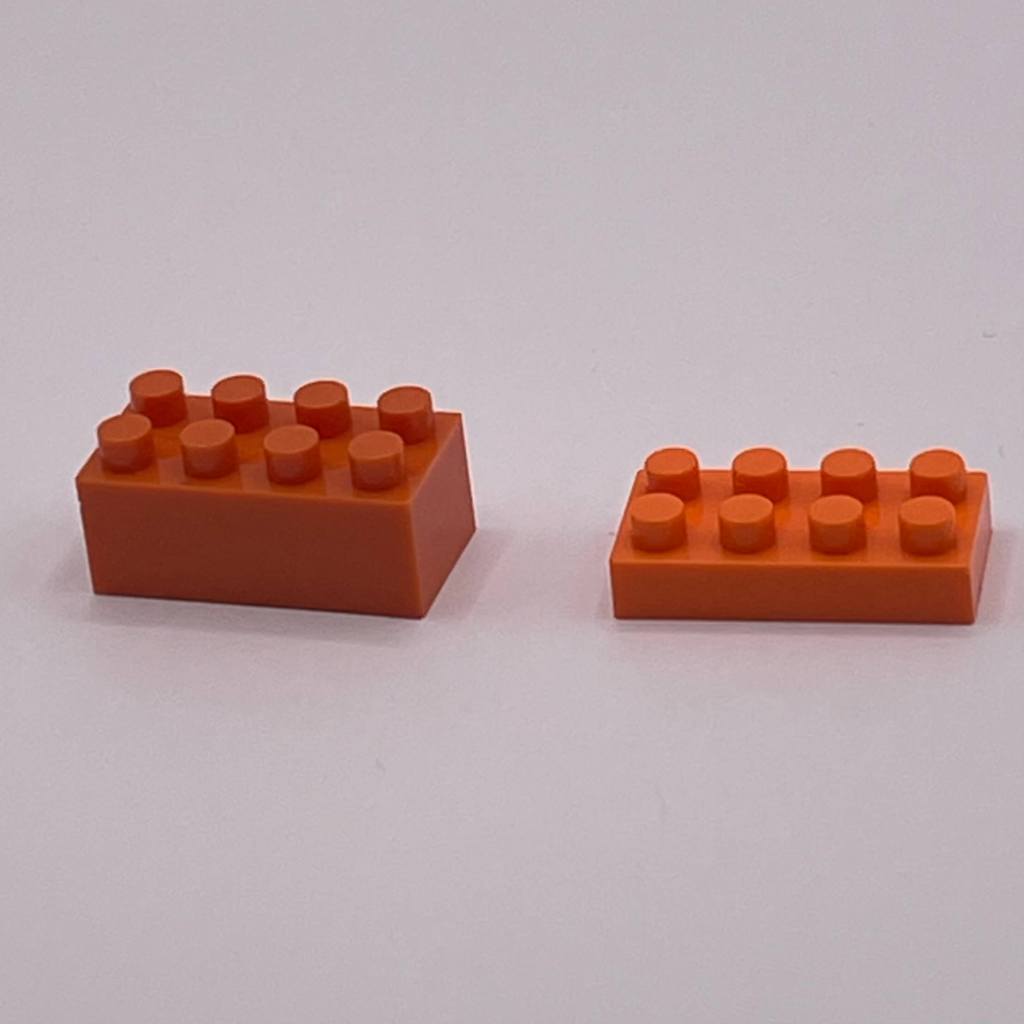 Comparing Nanoblock-width standard blocks versus the larger double-stacked blocks that come with this set.