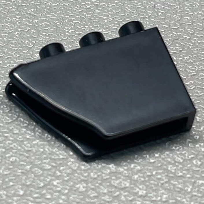 A broken brick that came with the arcade cabinet micro block building set.