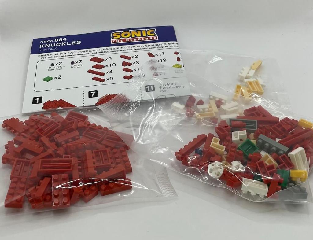 Unboxing the Nanoblock Knuckles set. It contains three bags of bricks and a folded, single-page instruction manual. 